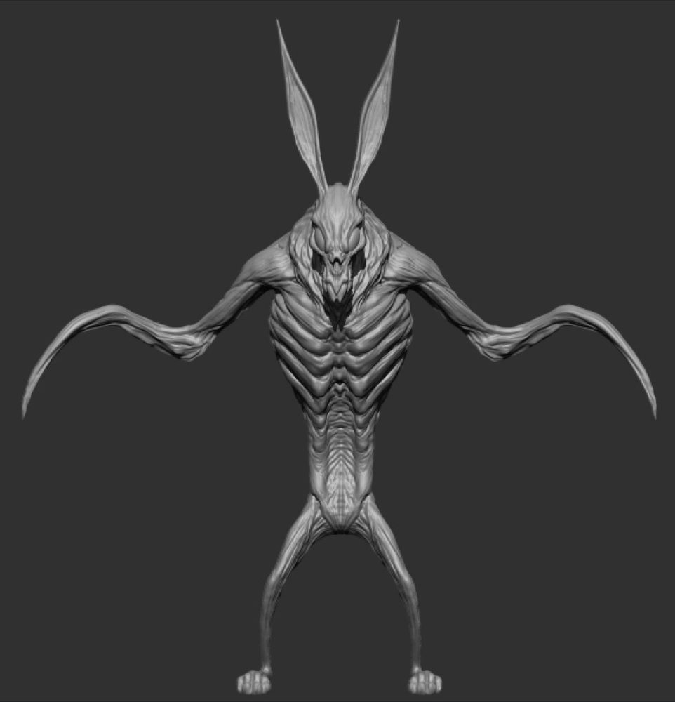 Front view of the rabbit-headed creature sculpt with arms spread.